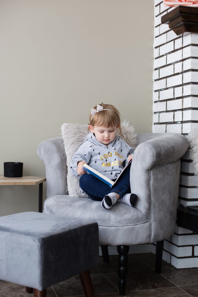 cuddled-up-in-a-big-chair-with-a-good-book